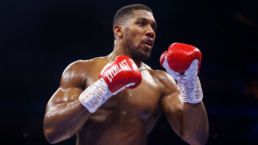 Anthony Joshua looks on during the Heavyweight fight between Anthony Joshua and Jermaine Franklin at The O2 Arena on April 01, 2023 in London, England. 