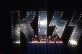Back for a big one: Kiss face the press for their mammoth 1996 tour