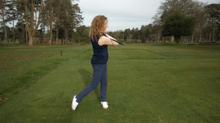 PGA pro Katie Dawkins sharing a tip on how to swing the golf club better