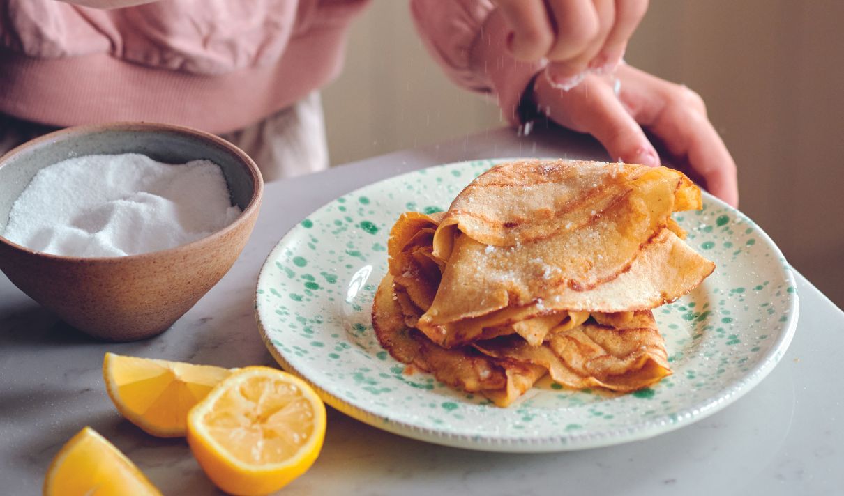 pancakes on a plate with lemon