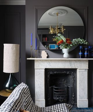 Mantel decor with grey wall and mirror