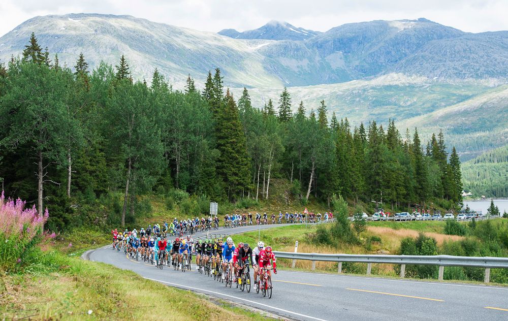 Cyclists ride during the 198,5 km second stage of the Arctic Race of Norway between Mo i Rana and Sandnessjoen