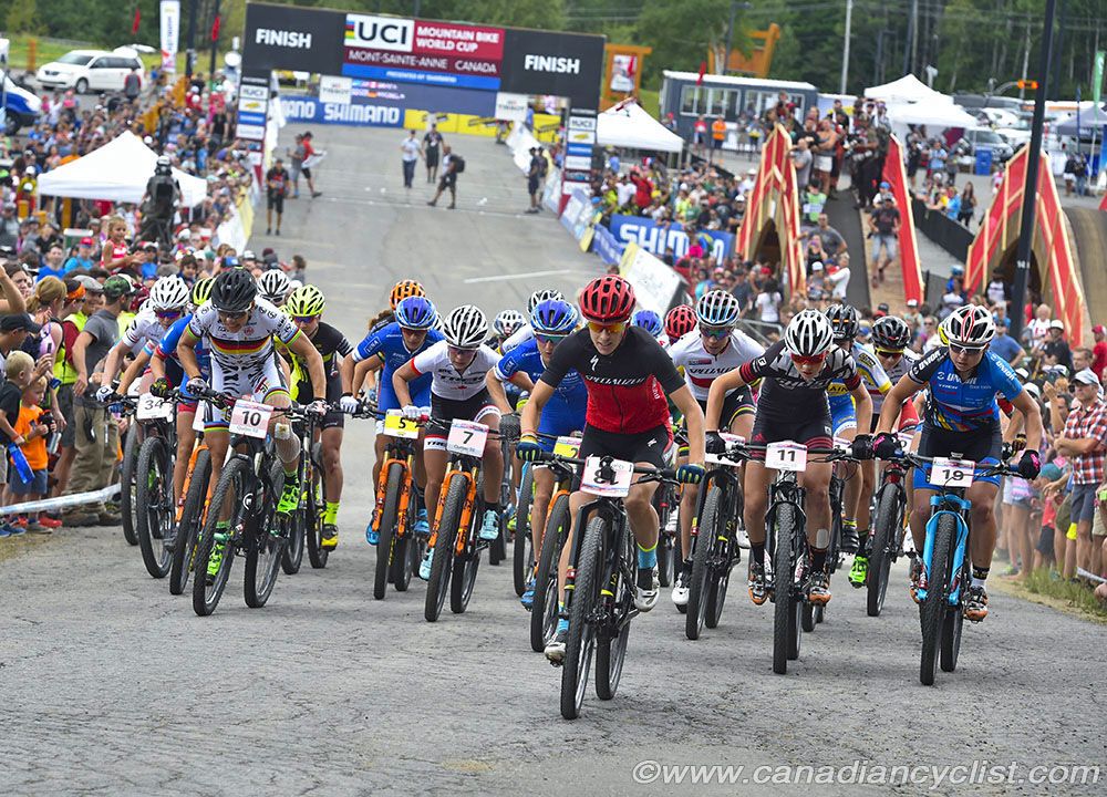 Start with Lea Davison (USA) Specialized Racing getting the holeshot