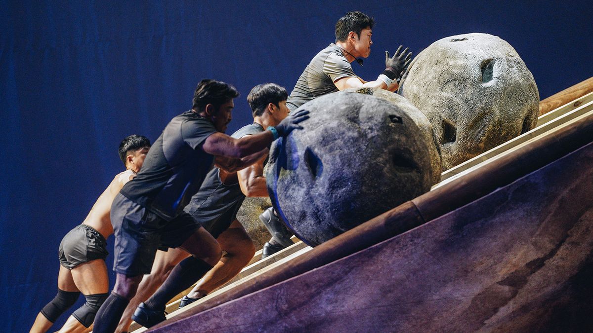 Physical: 100 contestants rolling boulders uphill during the Punishment of Sisyphus trial