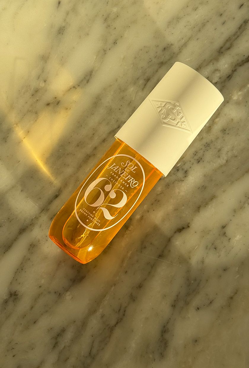 A photo of Sol De Janeiro Cheriosa 62 body mist on a marble surface