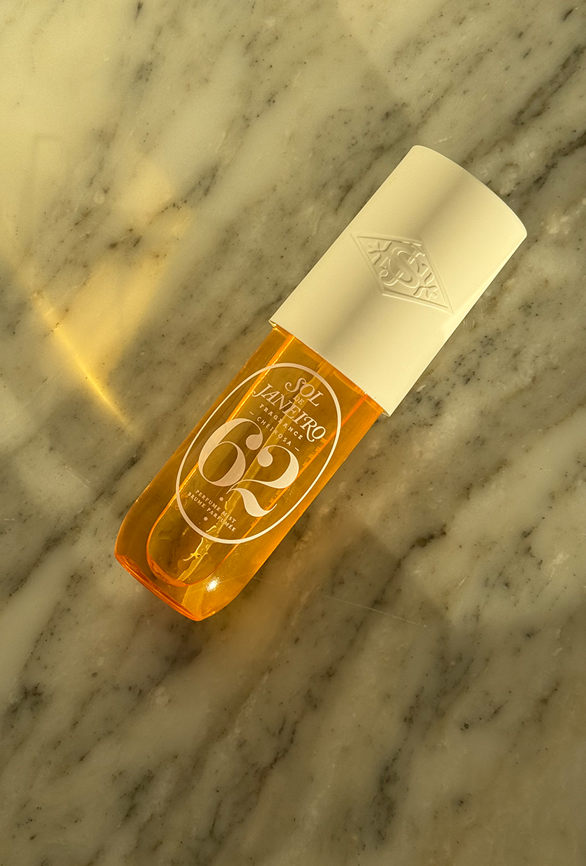 A photo of Sol De Janeiro Cheriosa 62 body mist on a marble surface
