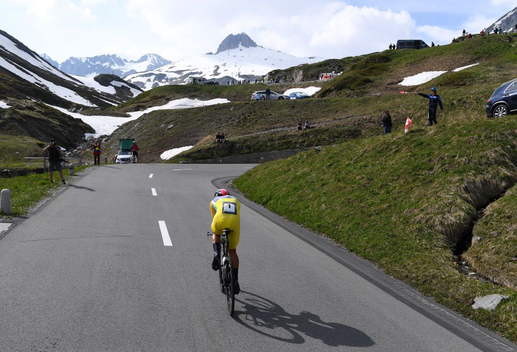 ANDERMATT SWITZERLAND JUNE 12 Richard Carapaz of Ecuador and Team INEOS Grenadiers Yellow Leader Jersey during the 84th Tour de Suisse 2021 Stage 7 a 232km Individual Time Trial stage from DisentisSedrun to Andermatt ITT Mountains Snow Landscape UCIworldtour tds tourdesuisse on June 12 2021 in Andermatt Switzerland Photo by Tim de WaeleGetty Images
