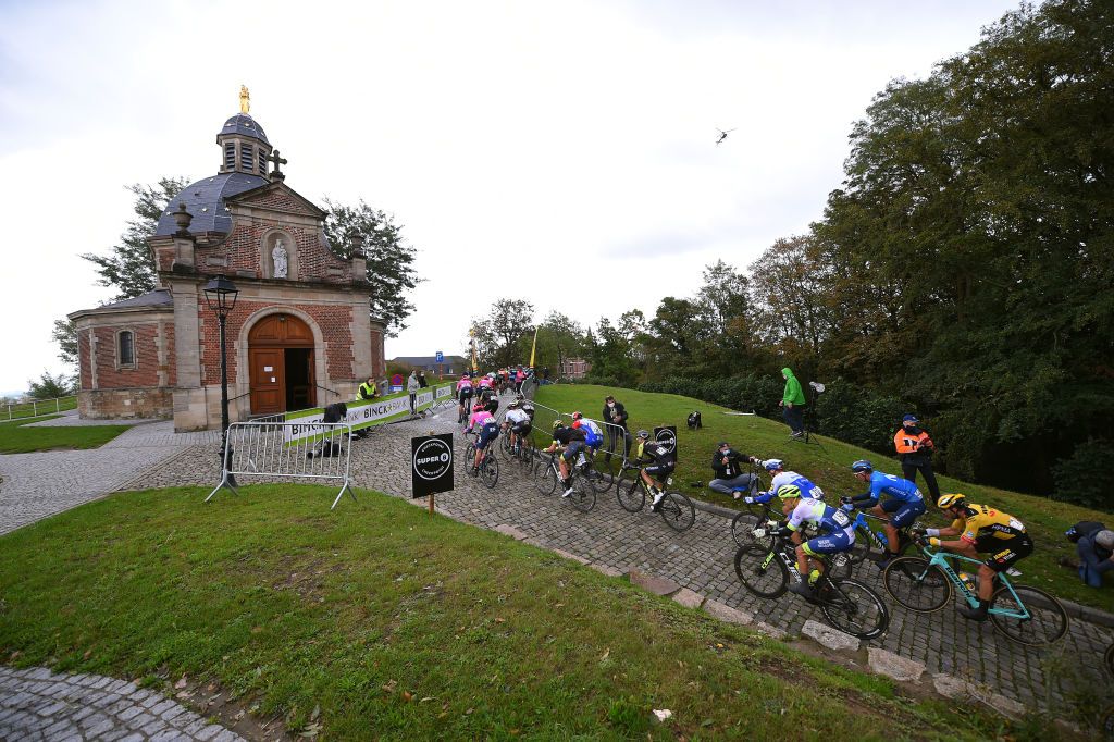GERAARDSBERGEN BELGIUM OCTOBER 03 Thomas Scully of New Zealand and Team EF Pro Cycling Shane Archbold of New Zealand and Team Deceuninck QuickStep Dion Smith of New Zealand and Team Mitchelton Scott Peloton Wall of Geraardsbergen Mur de Huy De Muur Fans Public Cobblestones during the 16th BinckBank Tour 2020 Stage 5 a 1836km stage from Ottignies Louvain la Neuve to Muur van Geraardsbergen 108m BinckBankTour BinckBankTour on October 03 2020 in Geraardsbergen Belgium Photo by Luc ClaessenGetty Images