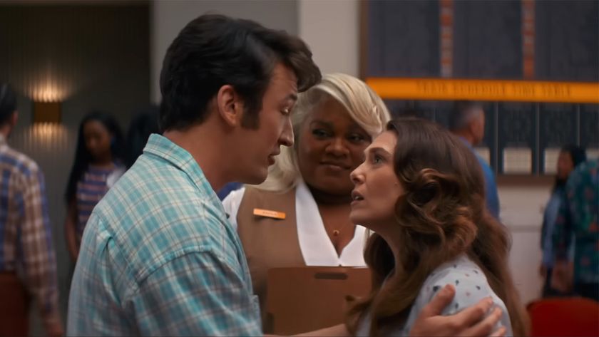 Miles Teller holds Elizabeth Olsen&#039;s shoulders as he makes a plea for the afterlife in Eternity.