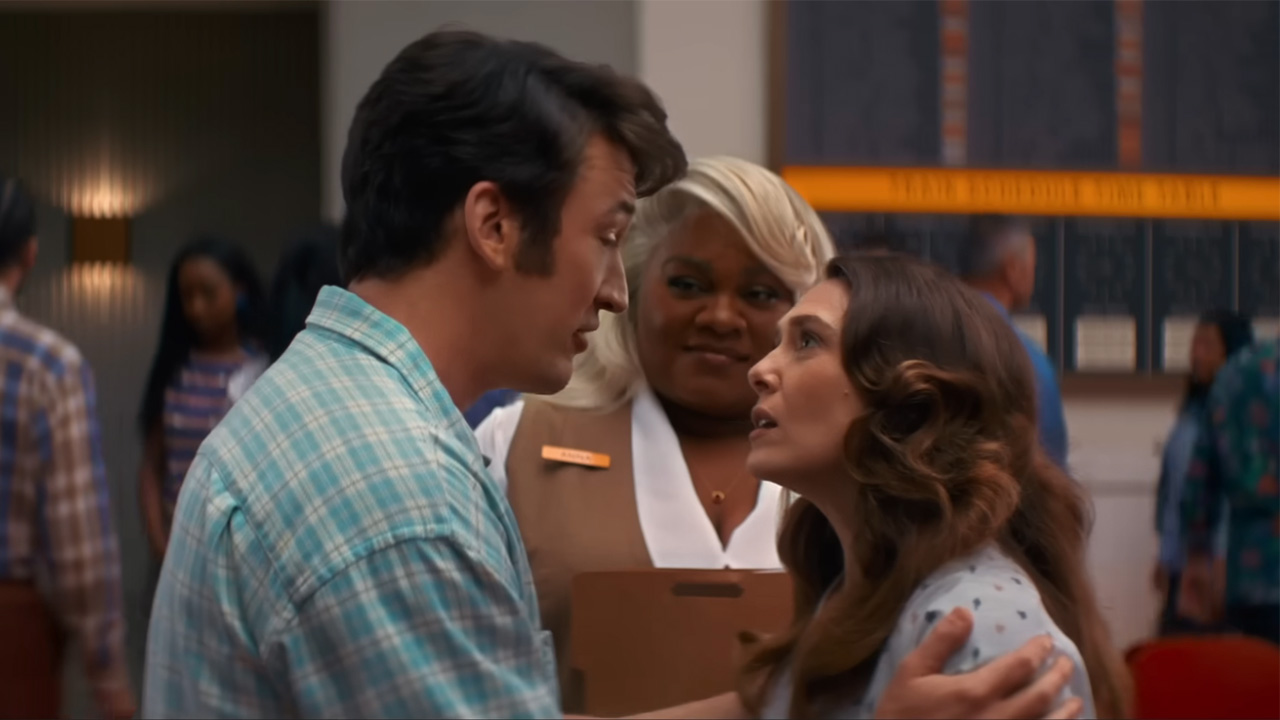 Miles Teller holds Elizabeth Olsen&#039;s shoulders as he makes a plea for the afterlife in Eternity.