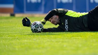 Gregor Kobel of Borussia Dortmund during a training session ahead of their UEFA Champions League 2024/25 quarter final second leg match in April 2025