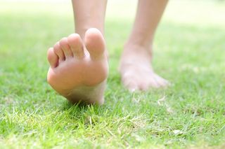 A person walking barefoot.