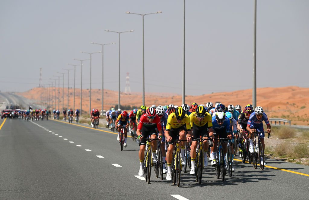 JEBEL JAIS UNITED ARAB EMIRATES FEBRUARY 21 Attila Valter of Hungary Mick Van Dijke of The Netherlands Loe van Belle of The Netherlands and Team VismaLease a Bike Fernando Gaviria of Colombia and Team Movistar and a general view of the peloton competing in echelons formation due to the crosswind during the 6th UAE Tour 2024 Stage 3 a 176km stage from Al Marjan Island Al Jazirah Al Hamra to Jebel Jais 1489m UCIWT on February 21 2024 in Jebel Jais United Arab Emirates Photo by Tim de WaeleGetty Images