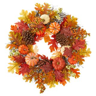 Fall wreath with leaves and pumpkins