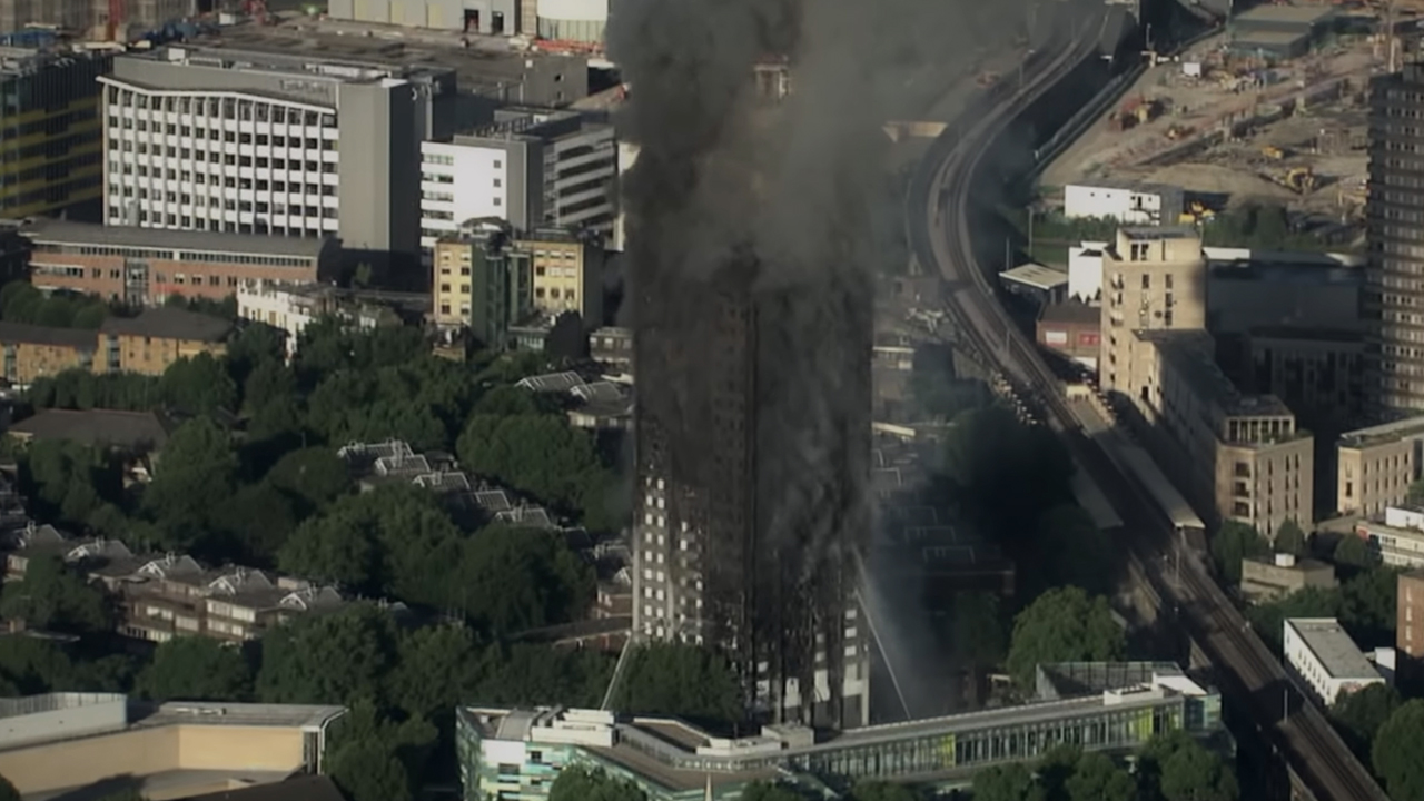 The smoking remains of the Grenfell Tower in Grenfell: Uncovered