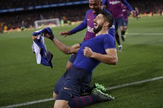 Luis Suarez celebrates his goal