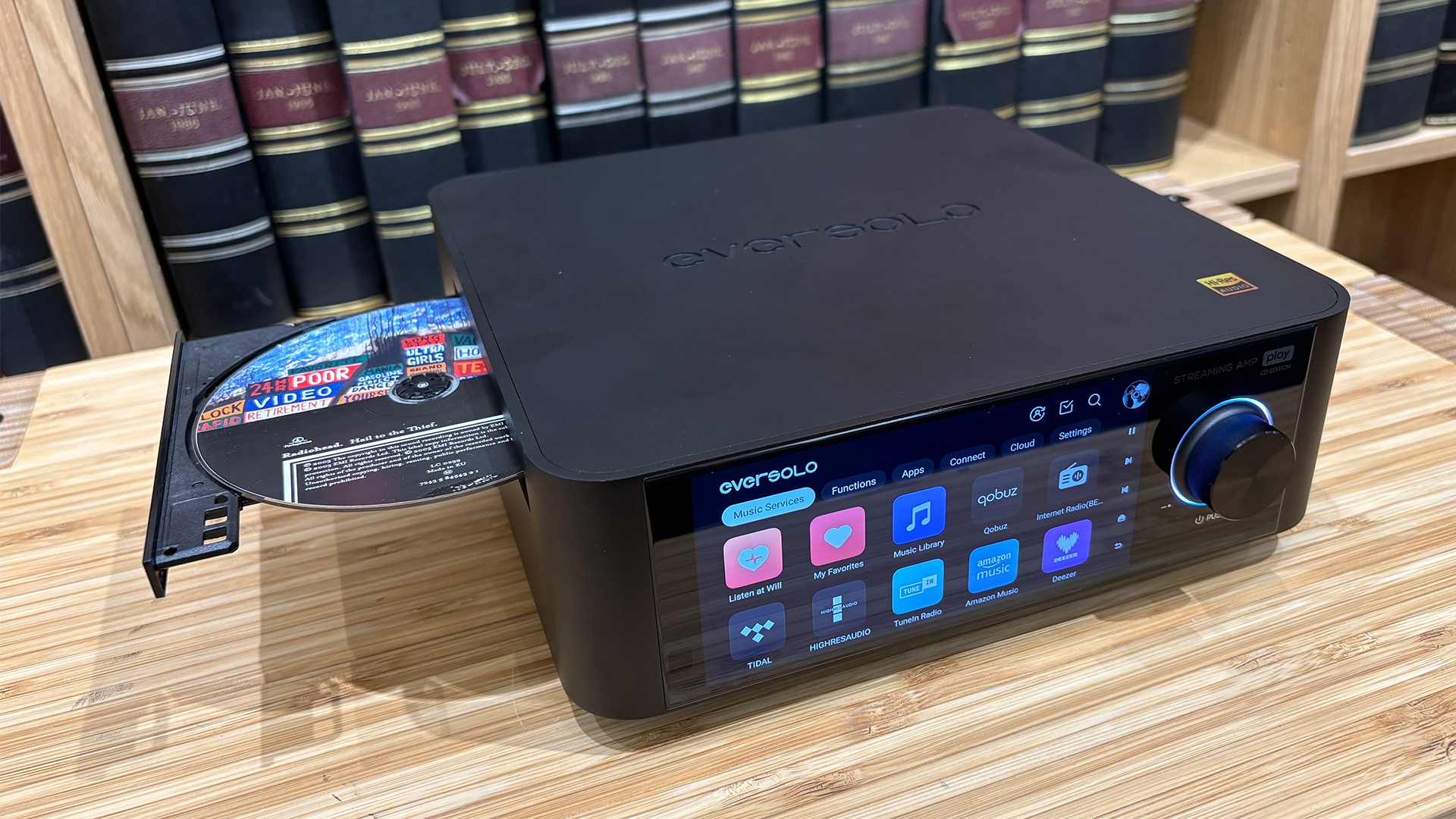 Eversolo Play CD Edition streaming amp/CD player with CD tray open, CD is in tray