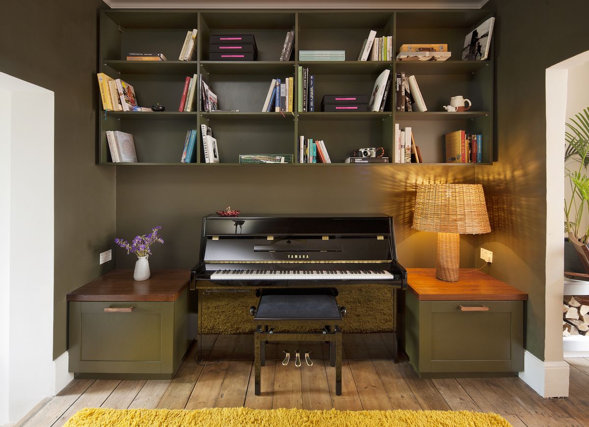 music room with built in shelving