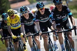 Team Sky protect Chris Froome in the block headwind during stage 14 Tour de France