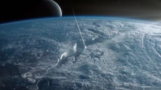 a streak of light flies into a deep crack on the surface of an icy planet