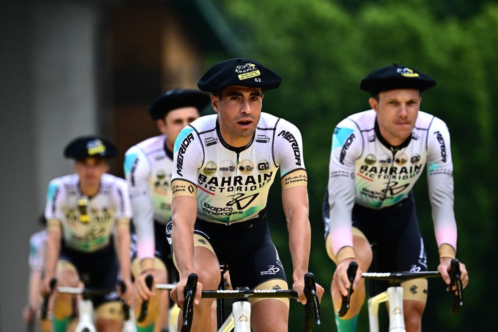 Bahrain Victorious Spanish rider Mikel Landa C and teammates cycle to the podium during the official teams presentation near the Guggenheim Museum Bilbao in Bilbao northern Spain on June 29 2023 two days prior to the start of the 110th edition of the Tour de France cycling race Photo by Marco BERTORELLO AFP Photo by MARCO BERTORELLOAFP via Getty Images