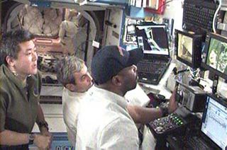 Astronauts Keep Busy After Spacewalk Delay