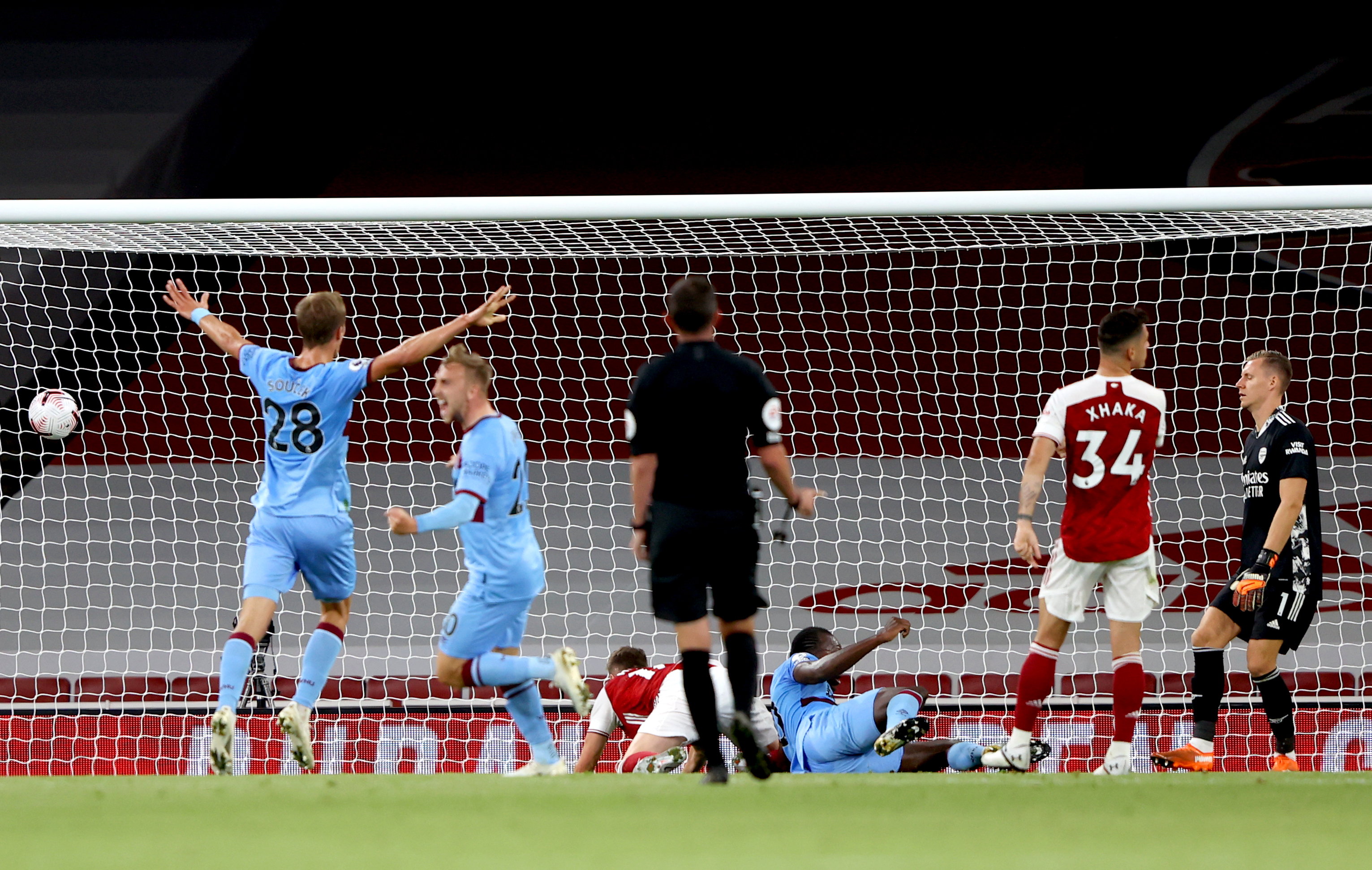 Michail Antonio, third right, floor, levelled for West Ham