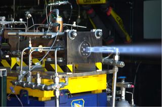 A laboratory-scale liquid rocket engine test at AFRL Rocket Lab.