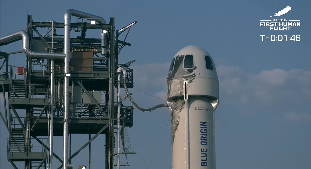 The New Shepard vehicle after the tower pulled away for launch on July 20, 2021.