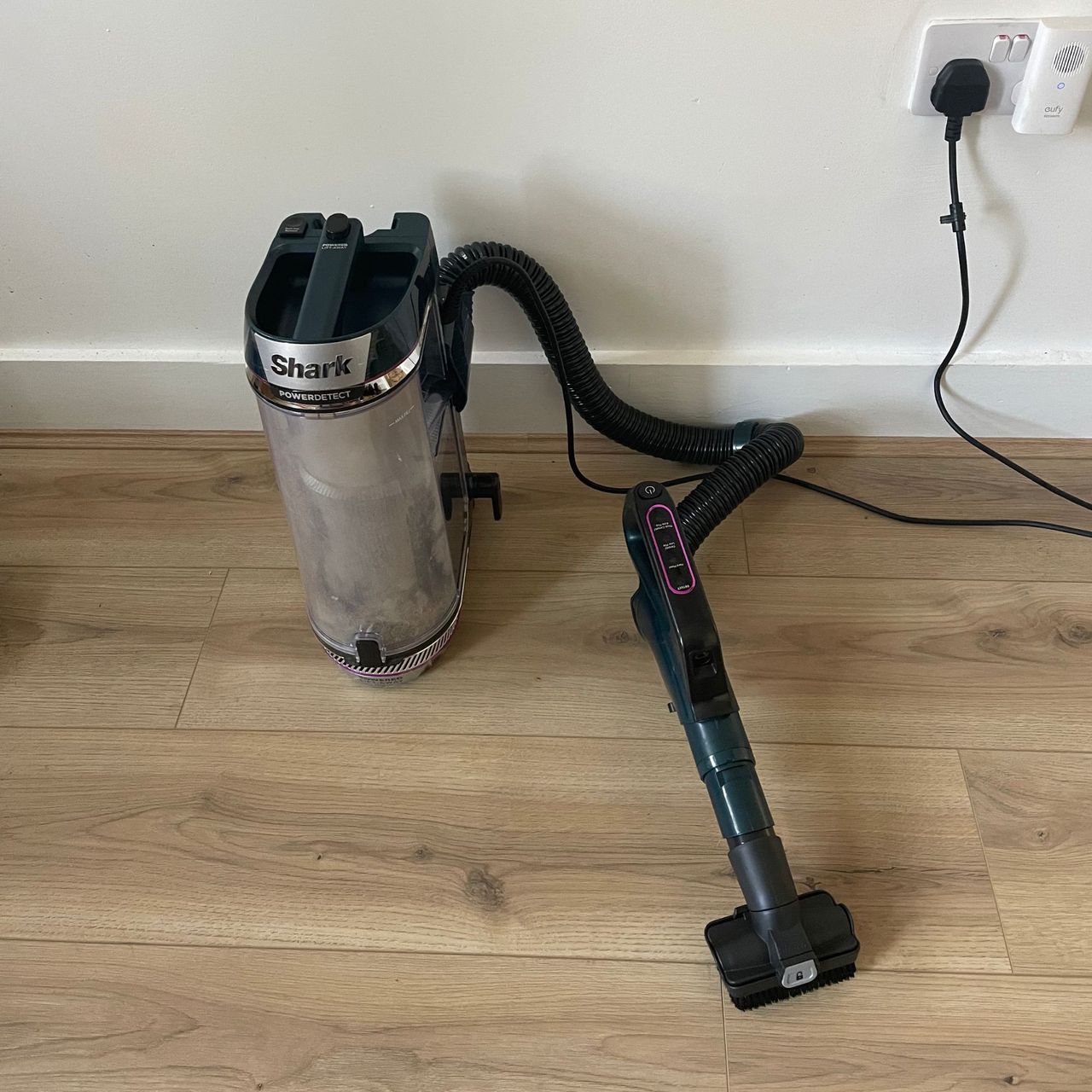 Shark PowerDetect Powered Lift-Away Upright Pet Vacuum Cleaner AZ3900UKT pop-out section sitting on wood-effect flooring