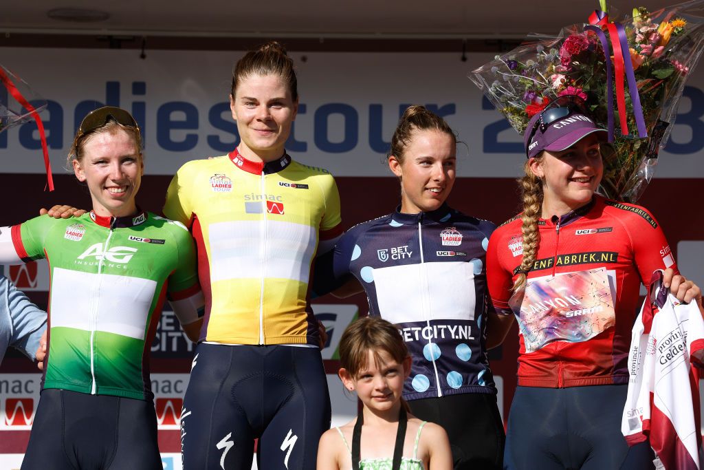 VALKENBURG NETHERLANDS SEPTEMBER 09 LR Lorena Wiebes of The Netherlands and Team SD Worx Green Points Jersey Lotte Kopecky of Belgium and Team SD Worx Yellow Leader Jersey Femke Gerritse of The Netherlands and Team Parkhotel Valkenburg Polka Dot Mountain Jersey and Zoe Backstedt of The United Kingdom and Team CanyonSram Racing White Best Young Rider most combative rider pose on the podium ceremony after the 25th Simac Ladies Tour 2023 Stage 4 a 1316km stage from Valkenburg to Valkenburg UCIWWT on September 09 2023 in Valkenburg Netherlands Photo by Bas CzerwinskiGetty Images