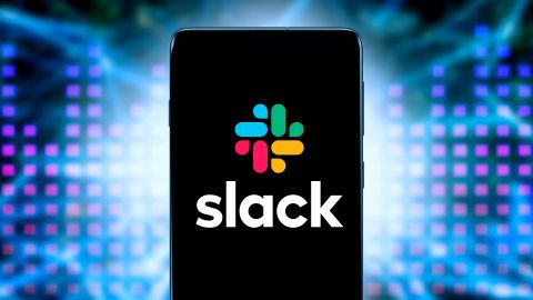 Slack on a smartphone in front of a blue background