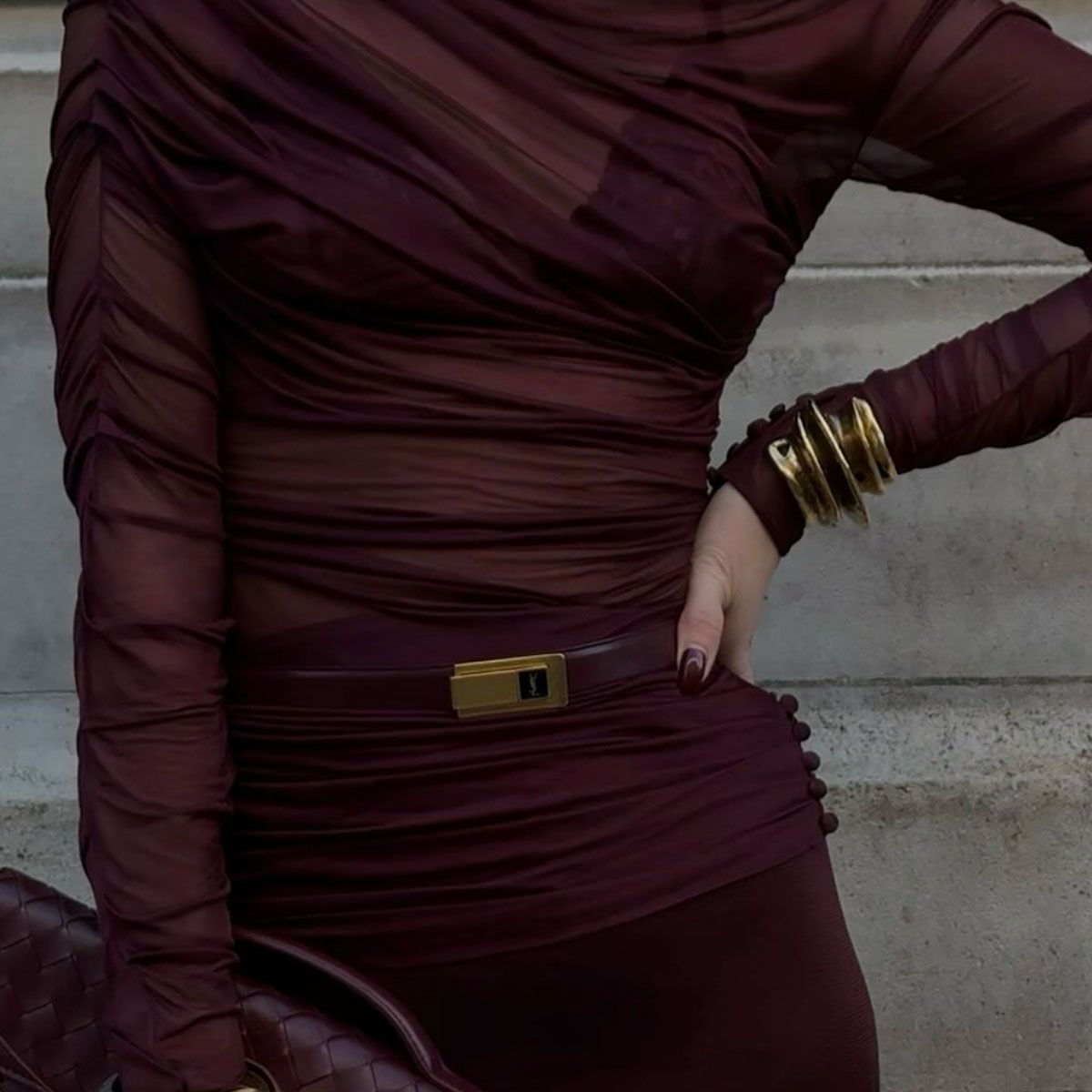 @hannahstraffordtaylor outfit closeup in burgundy with matching saint laurent belt and bottega veneta clutch