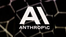 The Anthropic logo, in white on a dark background lit by a web-like light.