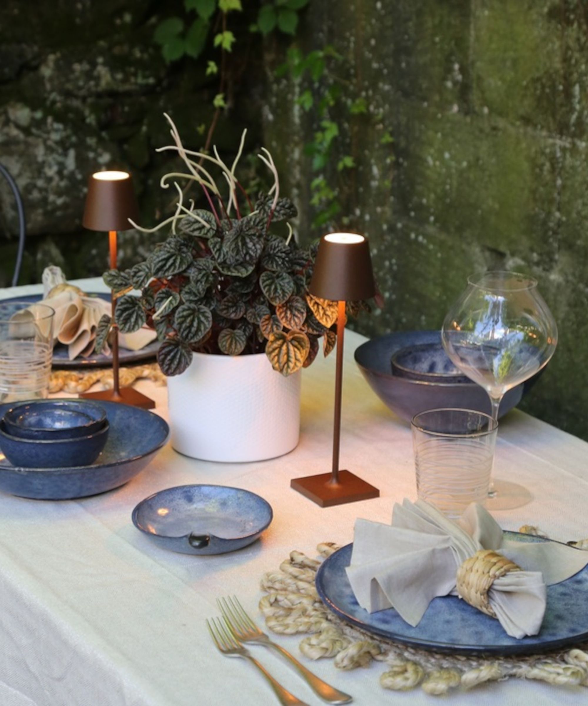 portable table lamp on garden table