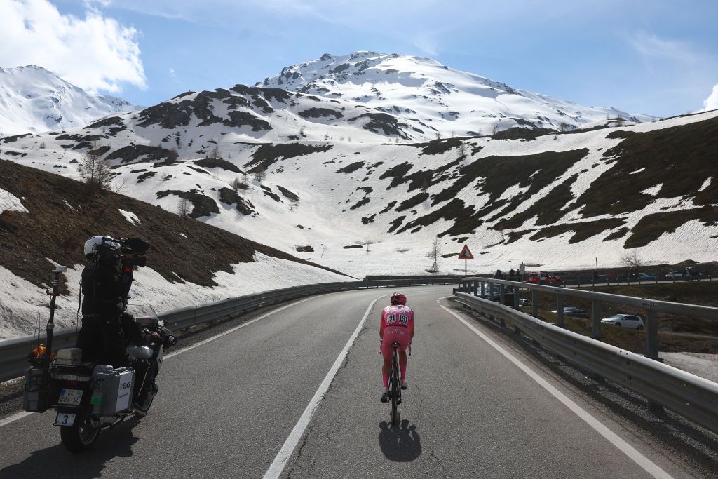 Pink jersey Team UAE's Slovenian rider Tadej Pogacar climbs during the 15th stage of the 107th Giro d'Italia cycling race, 222km between Manerba del Garda and Mottolino on May 19, 2024. (Photo by Luca Bettini / AFP)