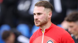 Alexis Mac Allister of Brighton & Hove Albion walks onto the pitch ahead of the Premier League match between Brighton & Hove Albion and Fulham at the American Express Community Stadium on 18 February, 2023 in Brighton and Hove, United Kingdom.
