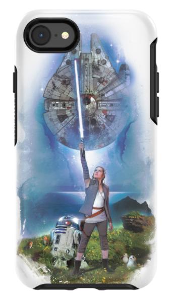 Rey holding a blue lightsaber beside R2D2