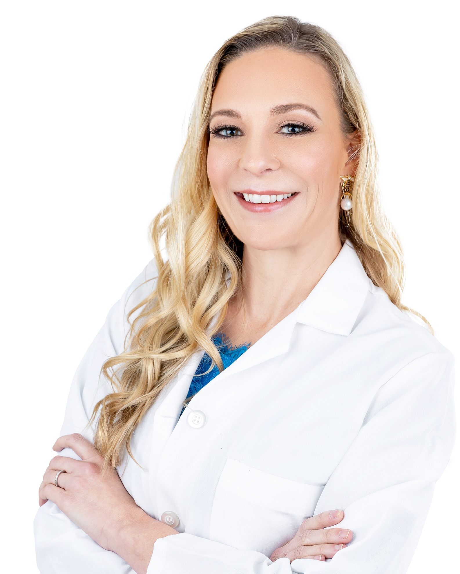 a white woman with long blonde hair in a white lab coat