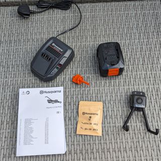 husqvarna aspire lc34 p4a battery pack, manual and accessories