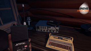 Looking at a radio and a typewriter while holding a walkie-talkie in Radiolight