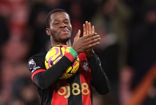 Dango Ouattara celebrates with the match ball after his hat-trick for Bournemouth against Nottingham Forest in January 2025.