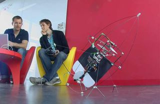 The flying AirBurr robot can pick itself up again on four wiry legs after it falls from the air.