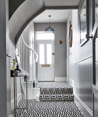 Grey hallway ideas by Carpetright with monochrome black and white Greek key carpet