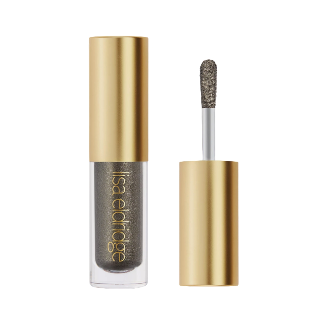 In a product shot of the Lisa Eldridge Beauty Liquid Lurex Eyeshadow in Selene (a pewter, silver-green shade), on a white background