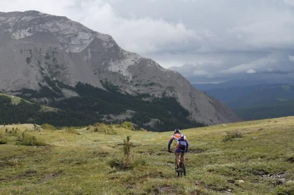 Adam Craig rides above the tree line.