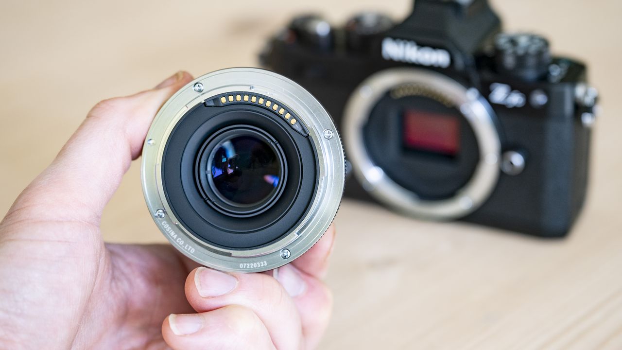 Voigtlander D 35mm f1.2 Nokton lens on a wooden table