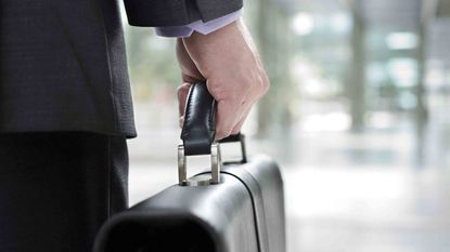 A man holding a briefcase