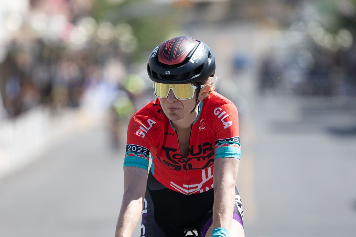 Lauren De Cresenzo (Cinch Rise) rolls across the line with road grime on her chin from her crash. She maintained her 14 second lead in the over Krista Dobel-Hickok in the GC competition.