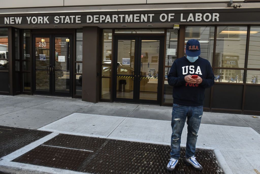  Luis Mora stands in front of the closed offices of the New York State Department of Labor on May 7, 2020